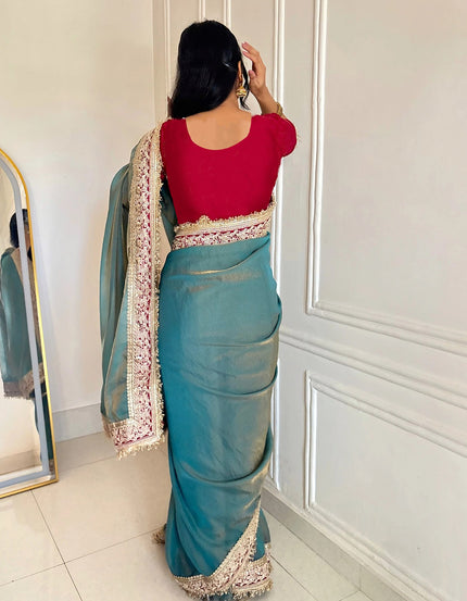 Fancy Blue Saree With Golden Embellished Border.