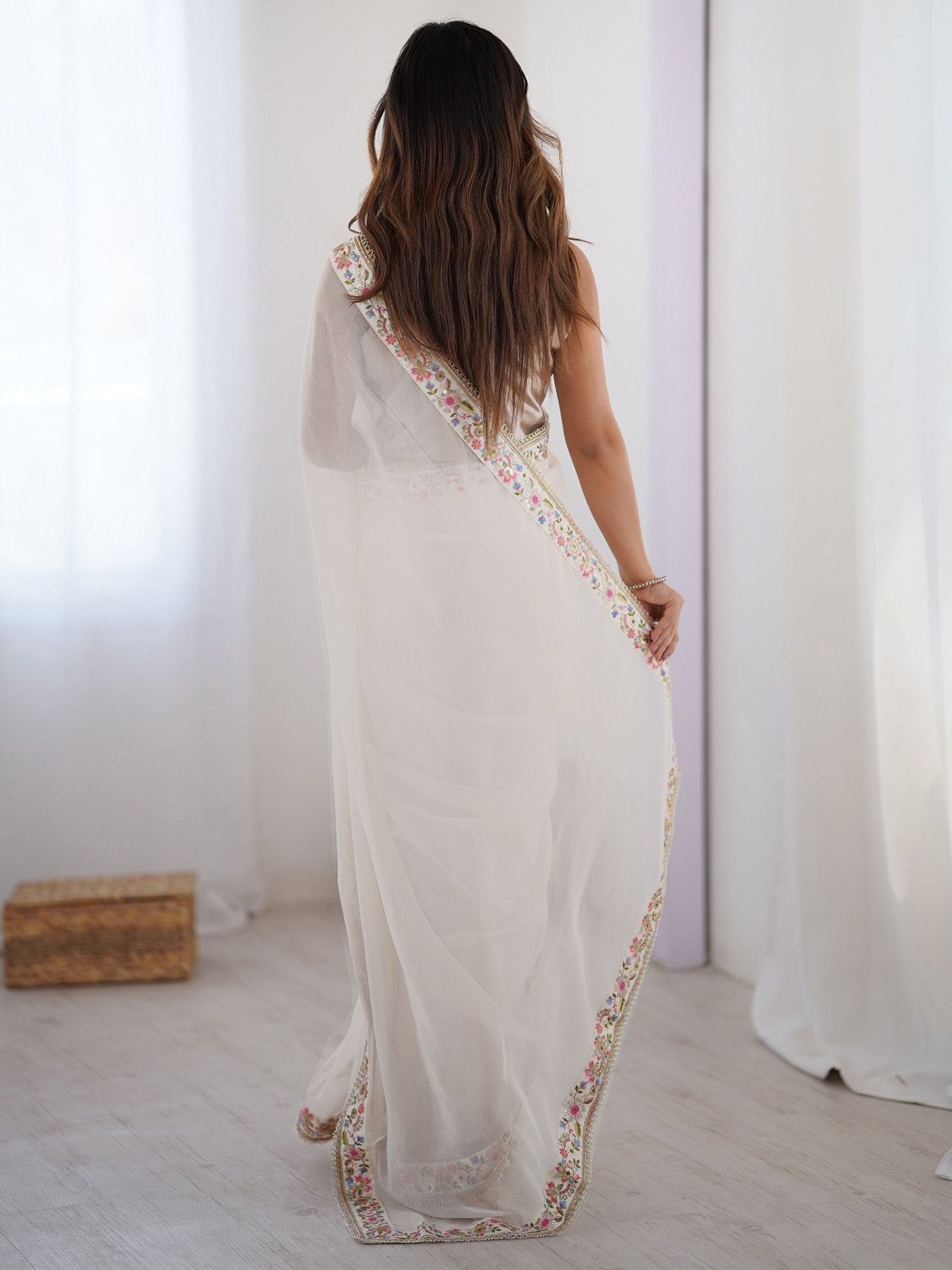 Premium Designer White Saree with Floral Embroidery Border.