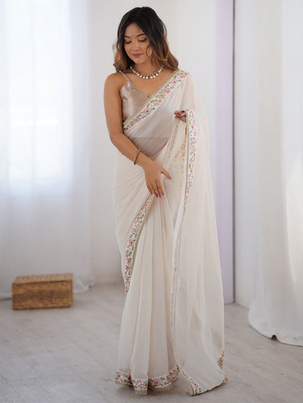 Premium Designer White Saree with Floral Embroidery Border.
