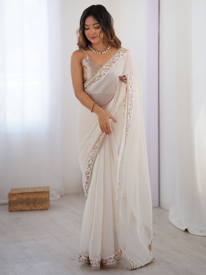 Premium Designer White Saree with Floral Embroidery Border.