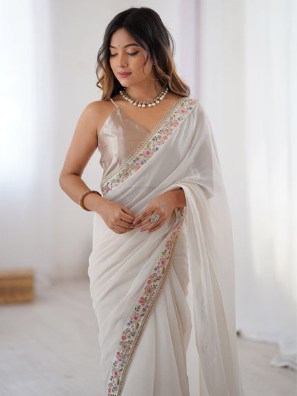 Premium Designer White Saree with Floral Embroidery Border.
