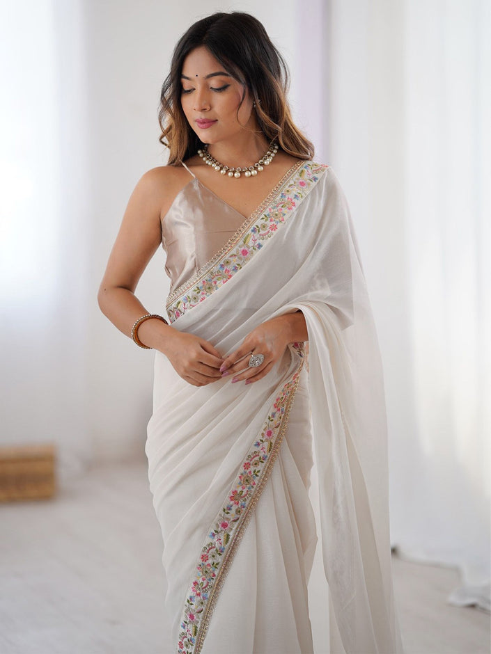 Premium Designer White Saree with Floral Embroidery Border.