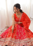 Designer Orange Embroidered Lehenga Choli with Elegant Dupatta for Women.