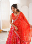 Designer Orange Embroidered Lehenga Choli with Elegant Dupatta for Women.