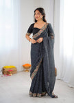 Elegant Purple Leheriya Saree with Rich Embroidered Border.