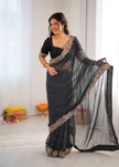 Elegant Purple Leheriya Saree with Rich Embroidered Border.