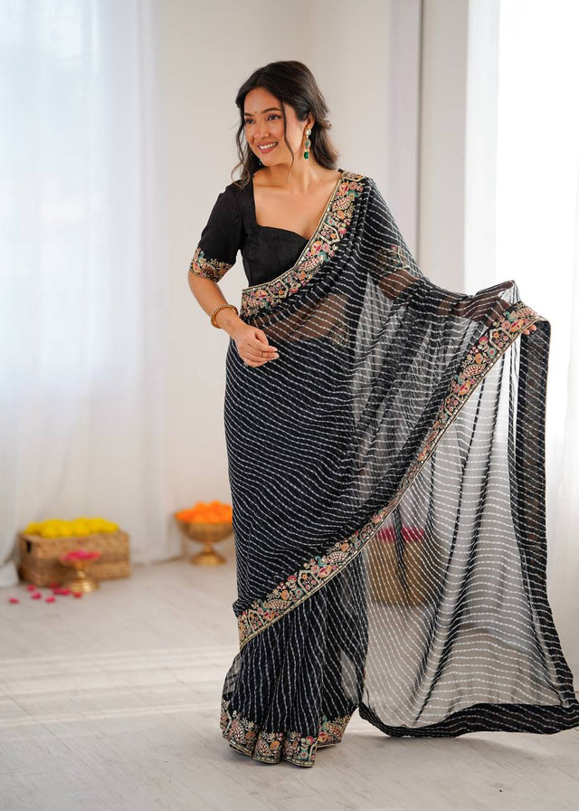 Elegant Purple Leheriya Saree with Rich Embroidered Border.