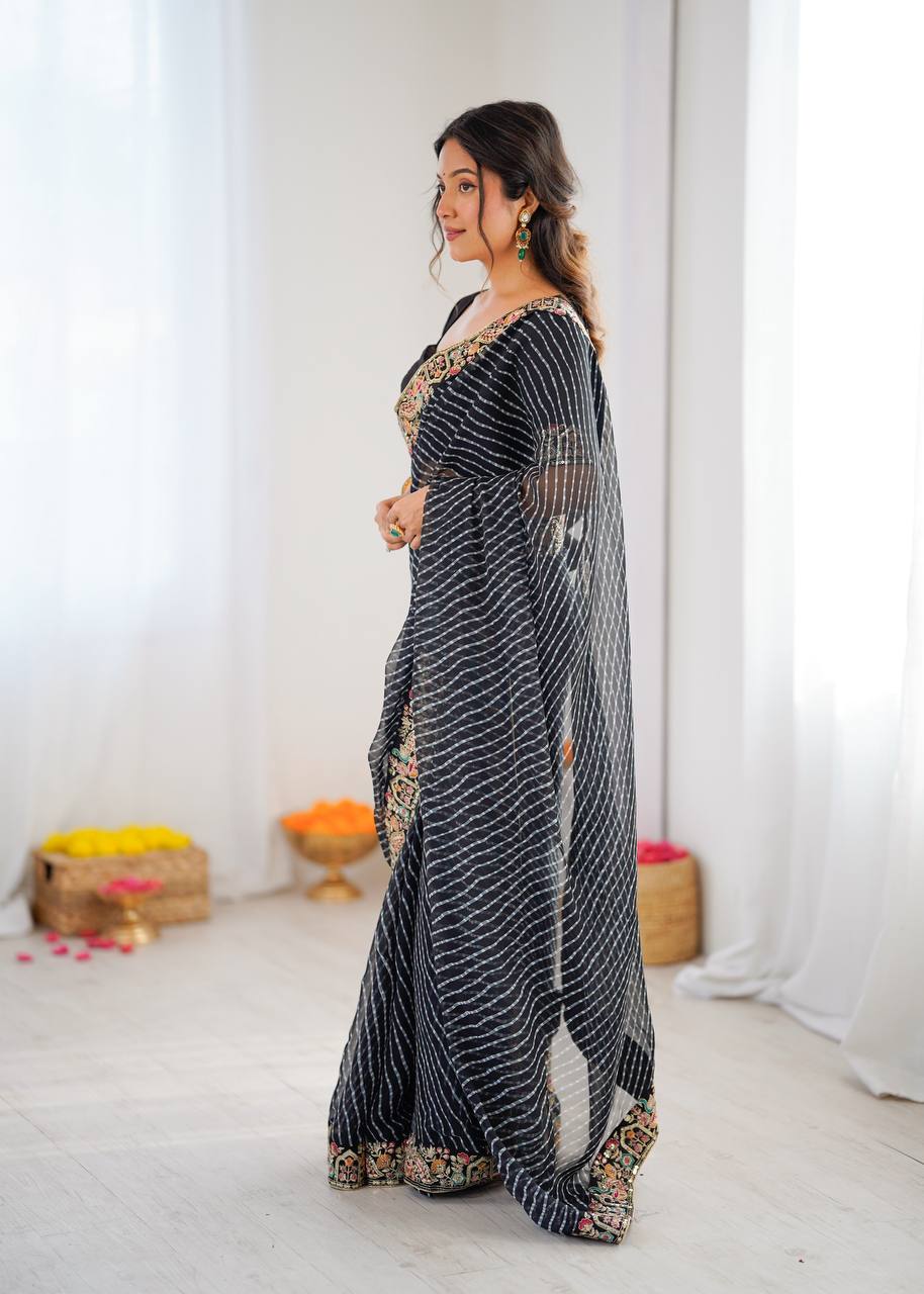 Elegant Purple Leheriya Saree with Rich Embroidered Border.