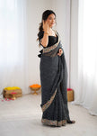 Elegant Purple Leheriya Saree with Rich Embroidered Border.