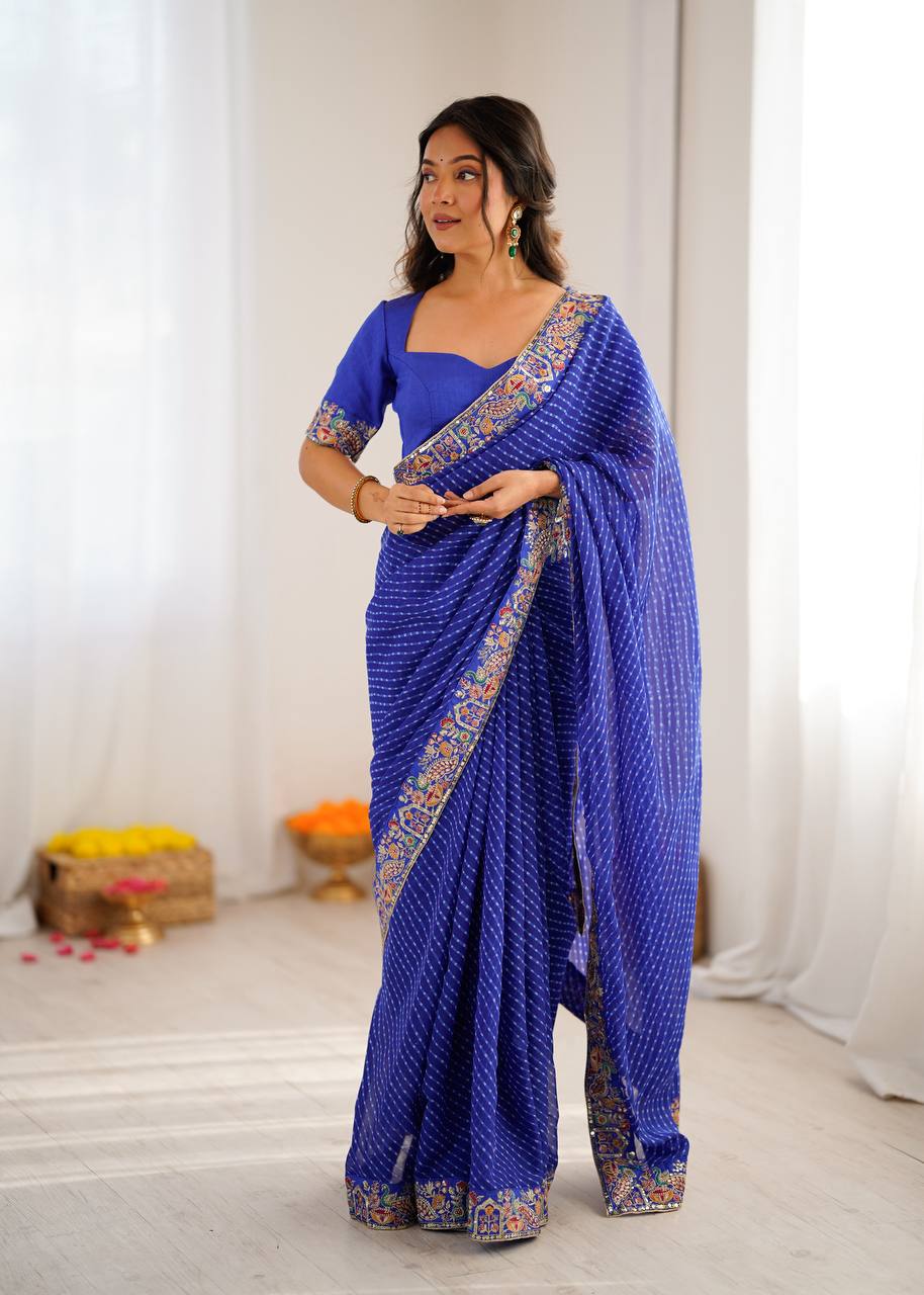 Elegant Purple Leheriya Saree with Rich Embroidered Border.