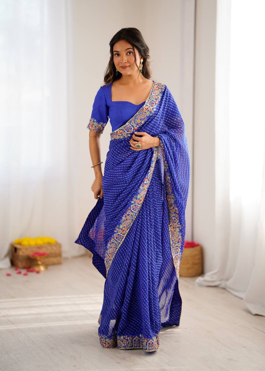 Elegant Purple Leheriya Saree with Rich Embroidered Border.