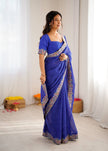Elegant Purple Leheriya Saree with Rich Embroidered Border.