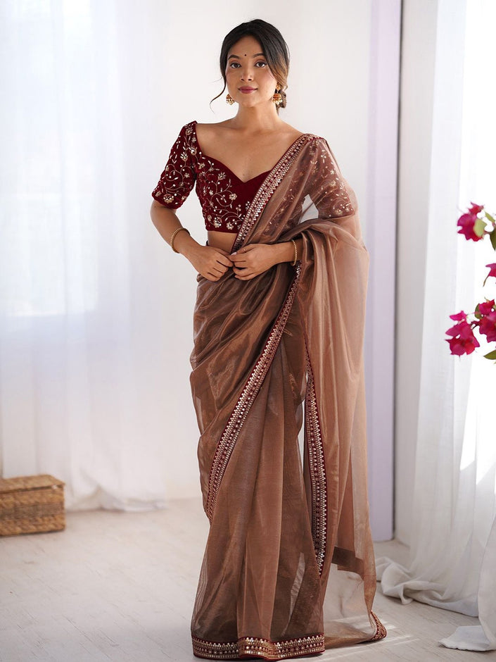 Traditional Brown Saree with Sequence Border Work.