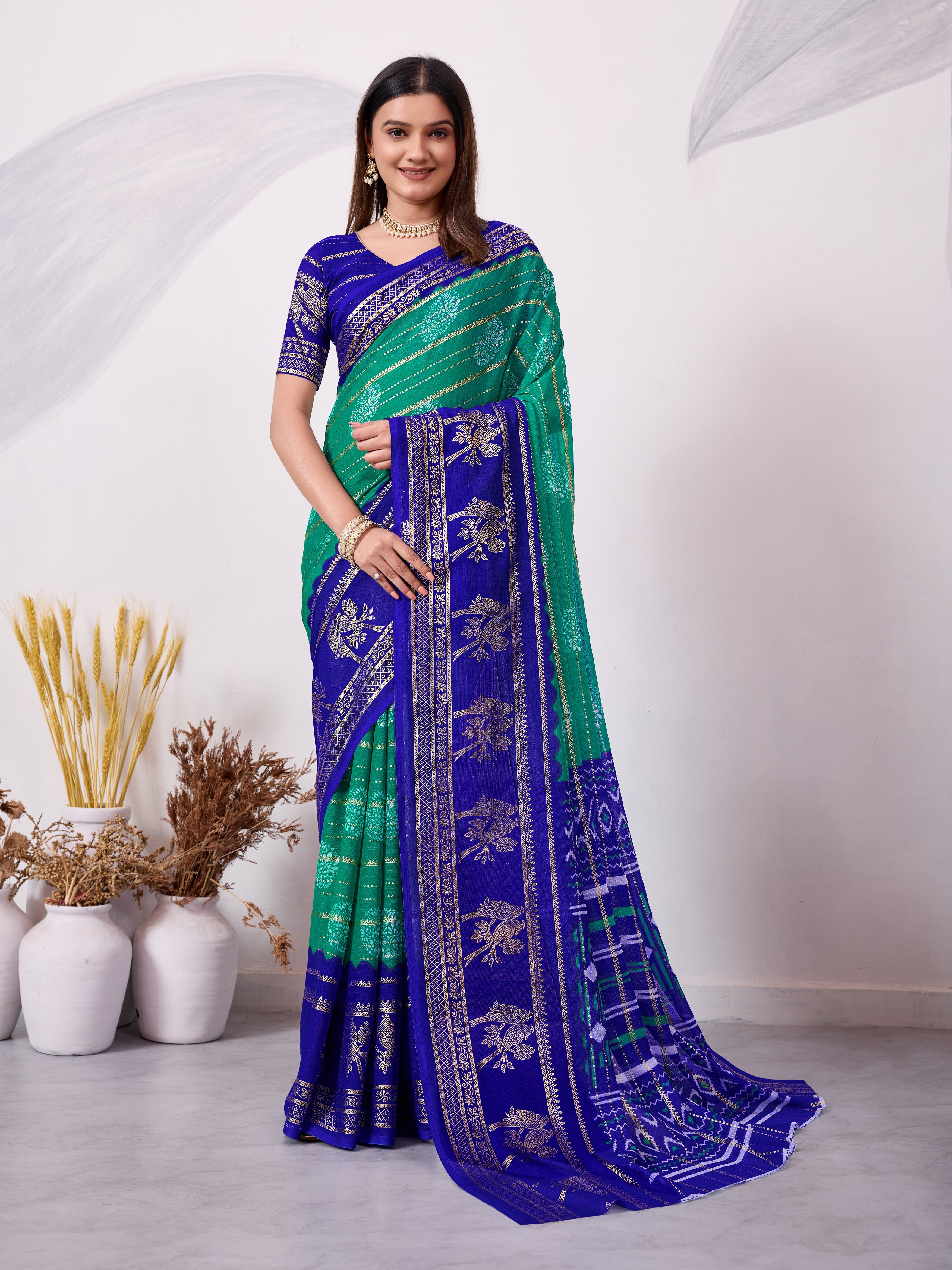 Rama and Blue traditional printed saree with gold zari border