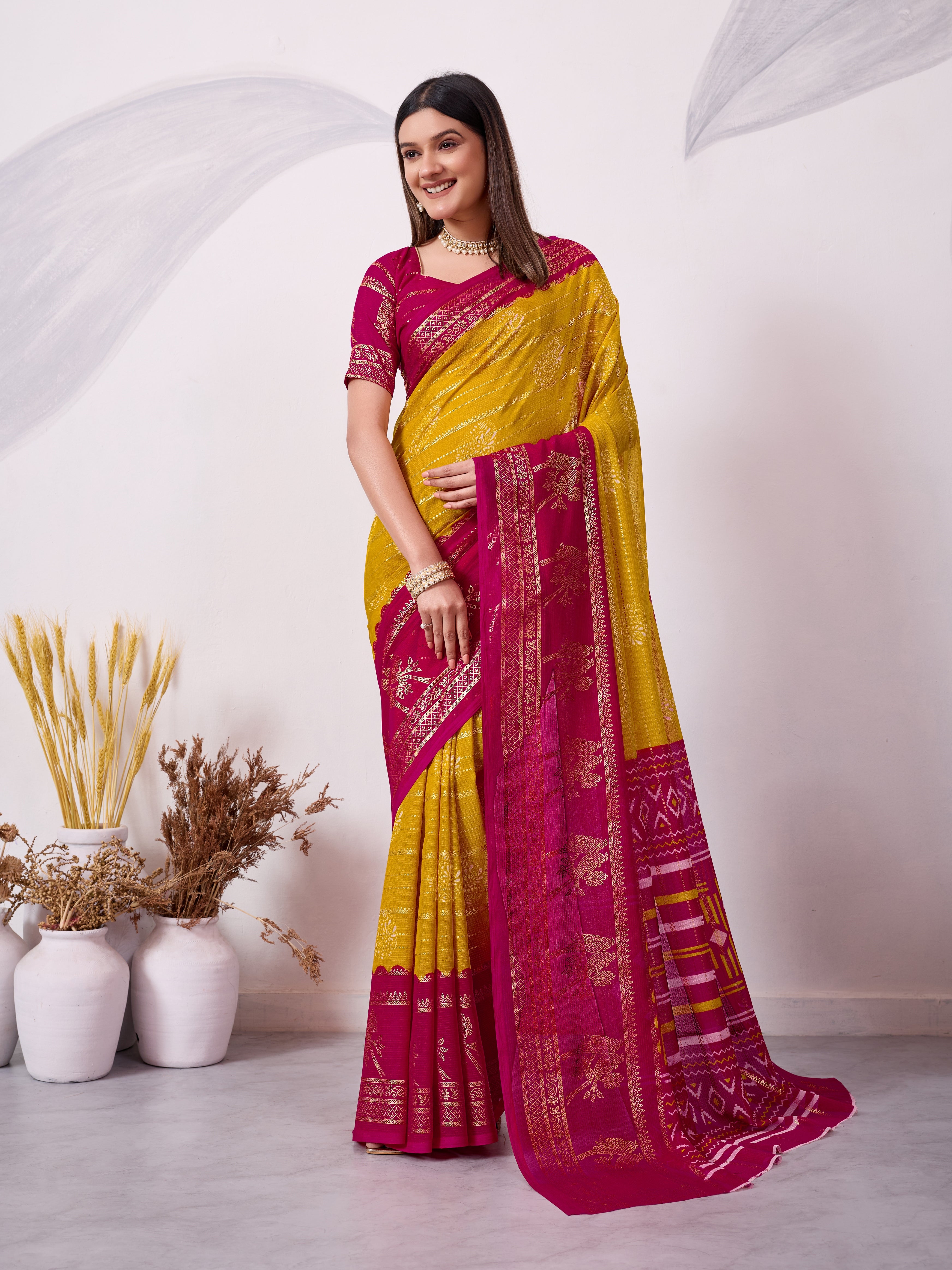Yellow and Pink traditional printed saree with gold zari border