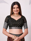 Elegant Printed Saree with Traditional Woven Border.