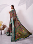 Elegant Printed Saree with Traditional Woven Border.