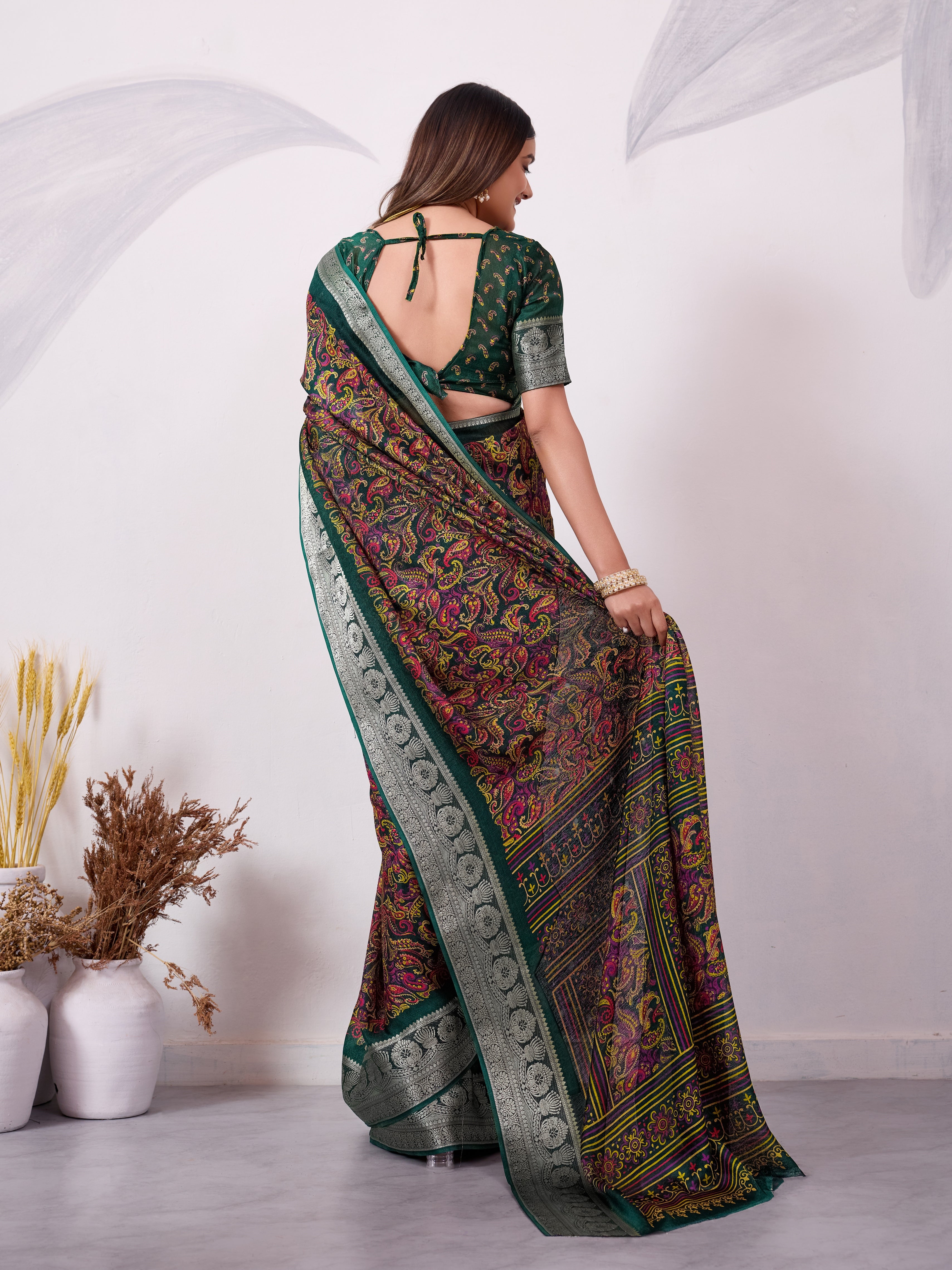 Elegant Printed Saree with Traditional Woven Border.