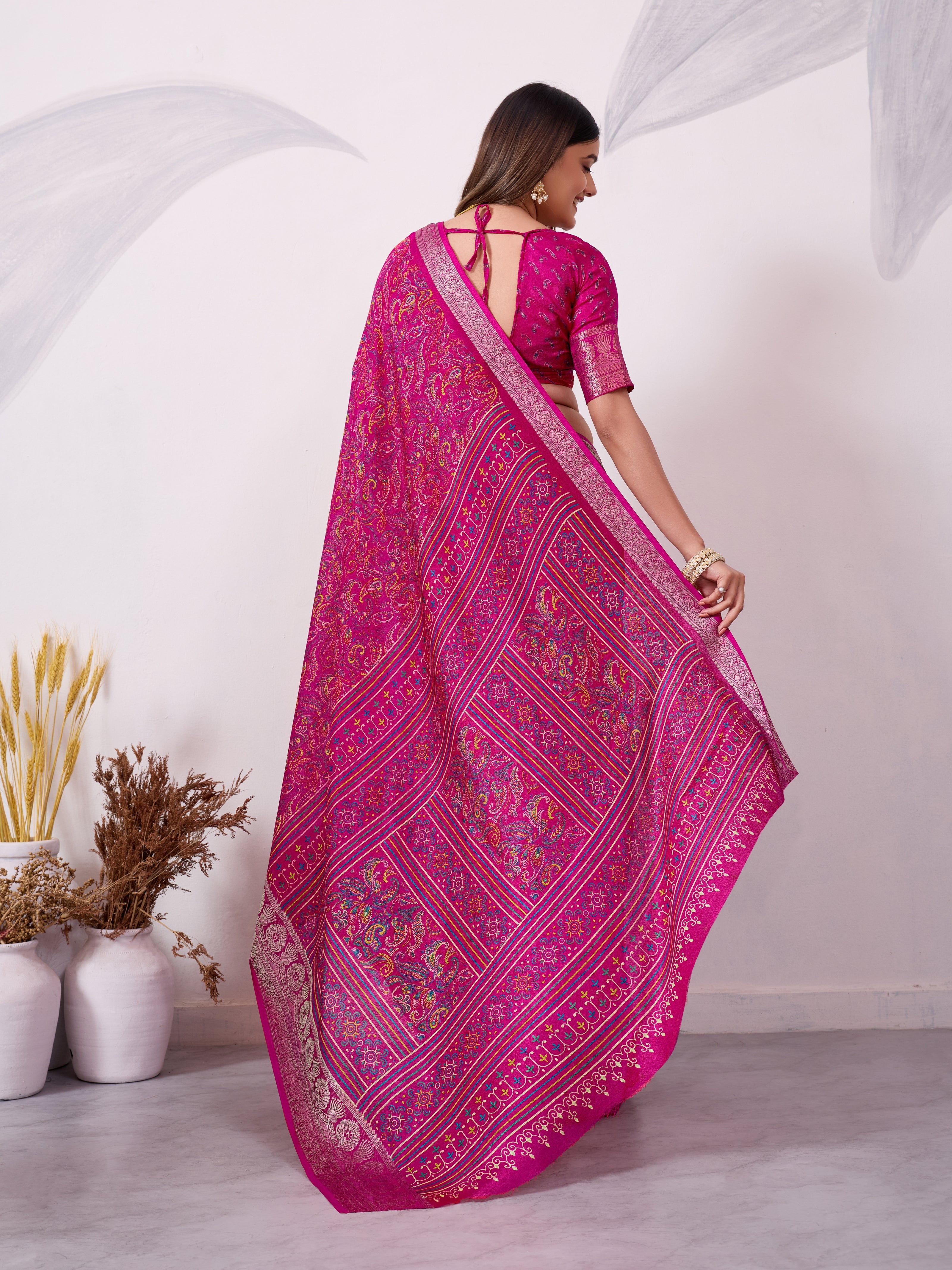 Elegant Printed Saree with Traditional Woven Border.