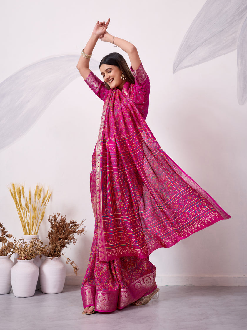 Elegant Printed Saree with Traditional Woven Border.