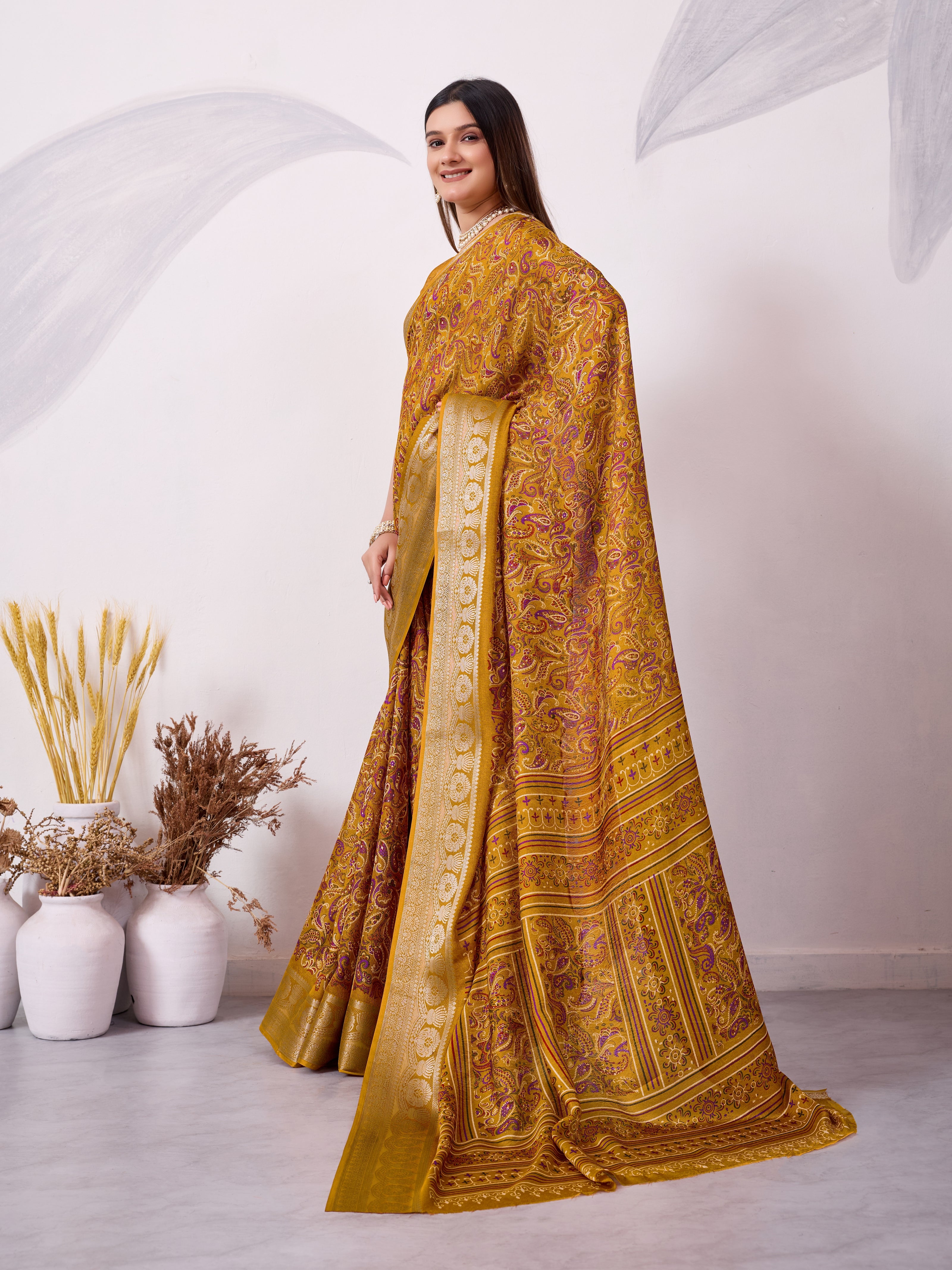 Elegant Printed Saree with Traditional Woven Border.