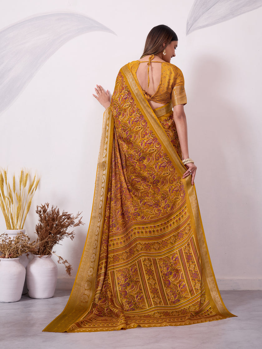 Elegant Printed Saree with Traditional Woven Border.