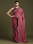 Elegant Magenta silk saree with red embroidered border and ethnic motifs