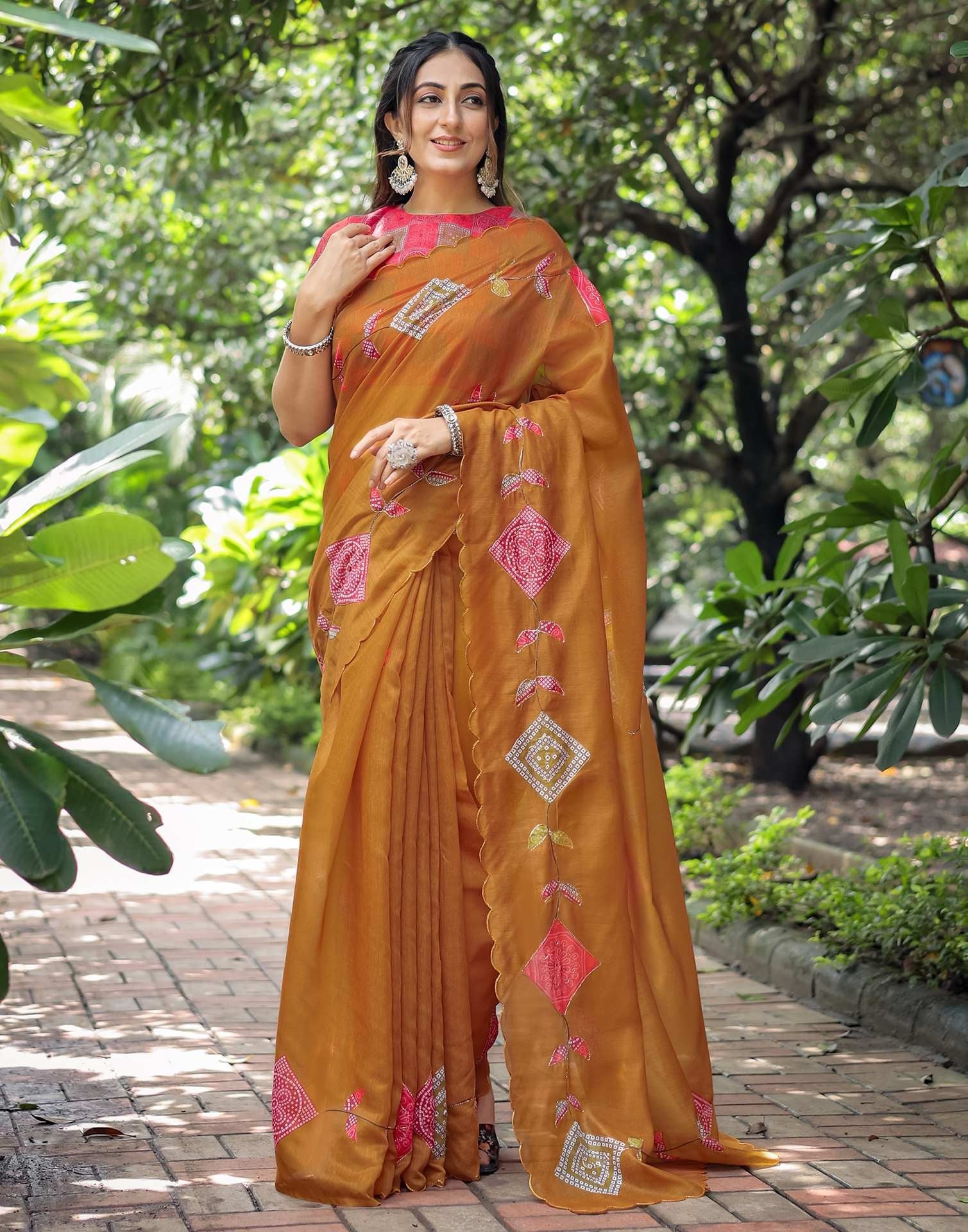Elegant Mustard printed georgette saree with red ethnic motifs worn by woman”
