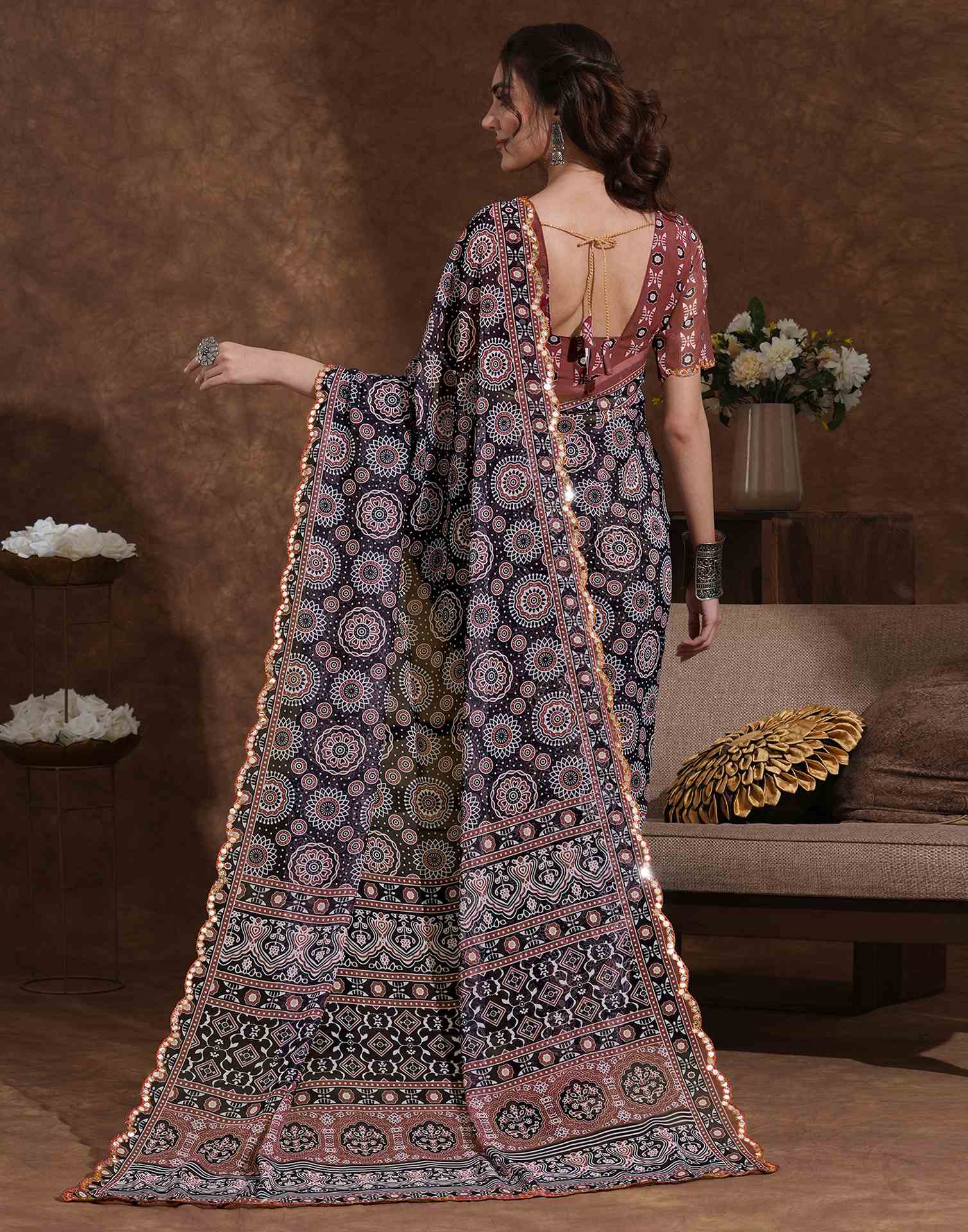 Traditional Printed Saree with Elegant Border for Daily & Festive Wear.