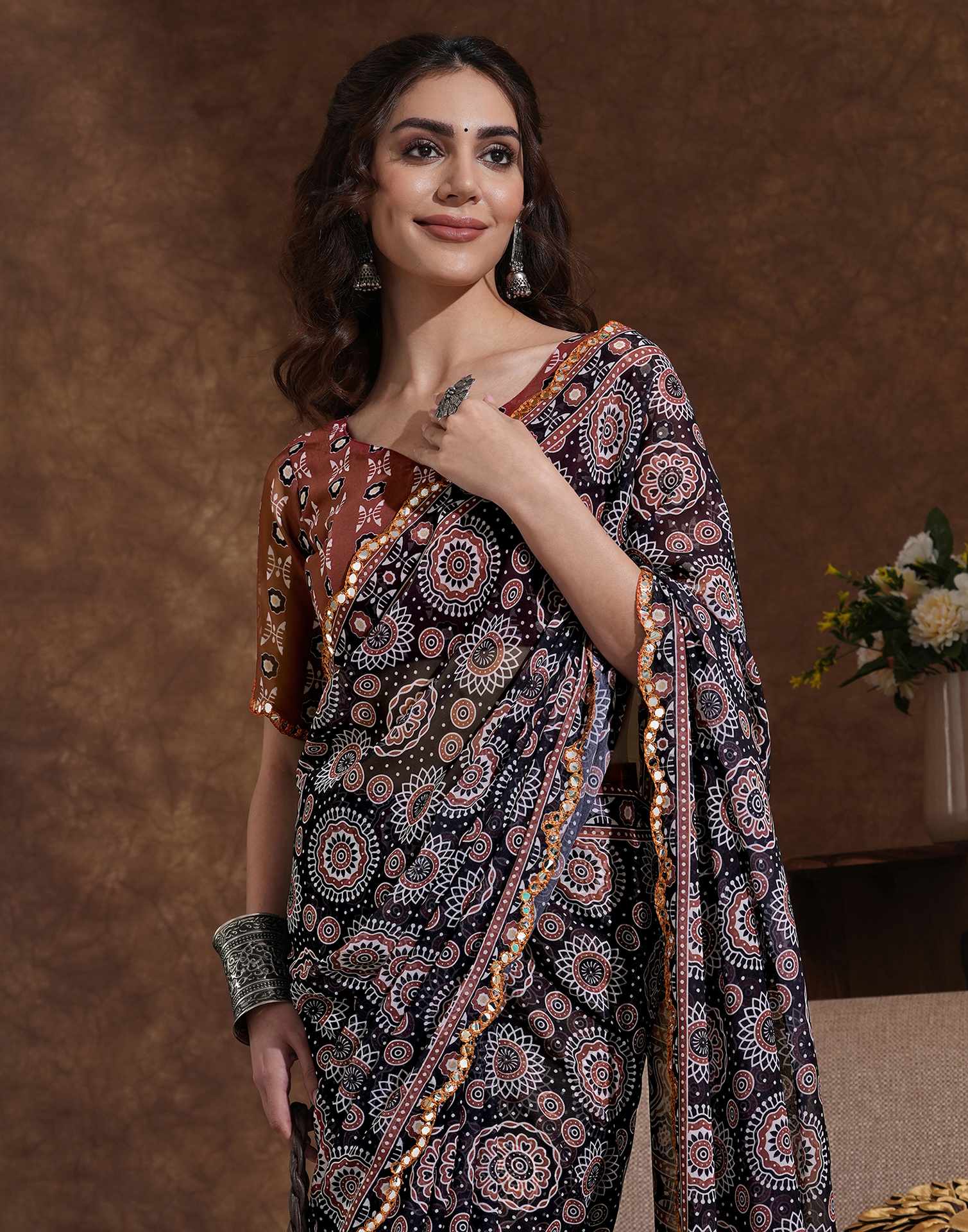 Traditional Printed Saree with Elegant Border for Daily & Festive Wear.