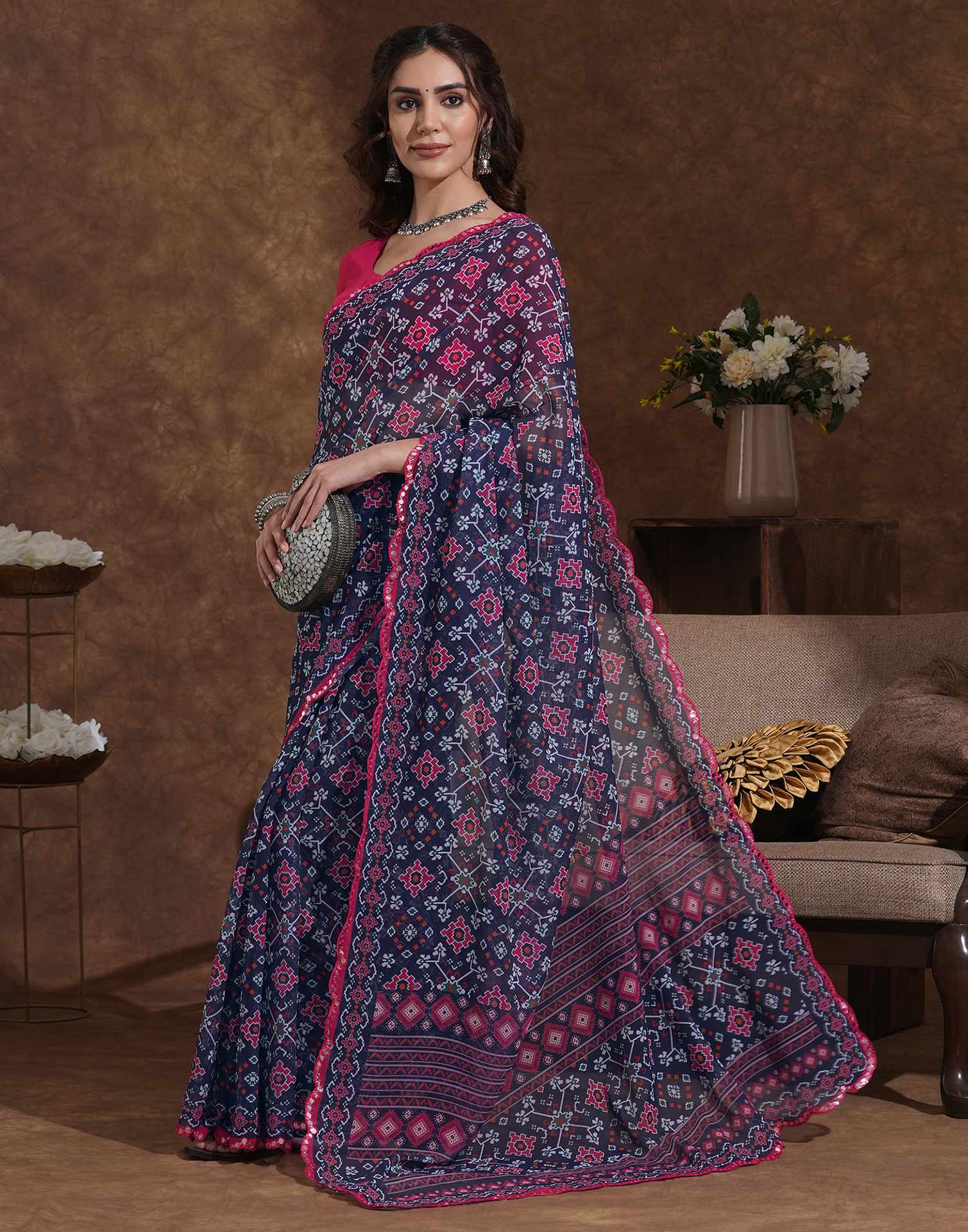 Traditional Printed Saree with Elegant Border for Daily & Festive Wear.