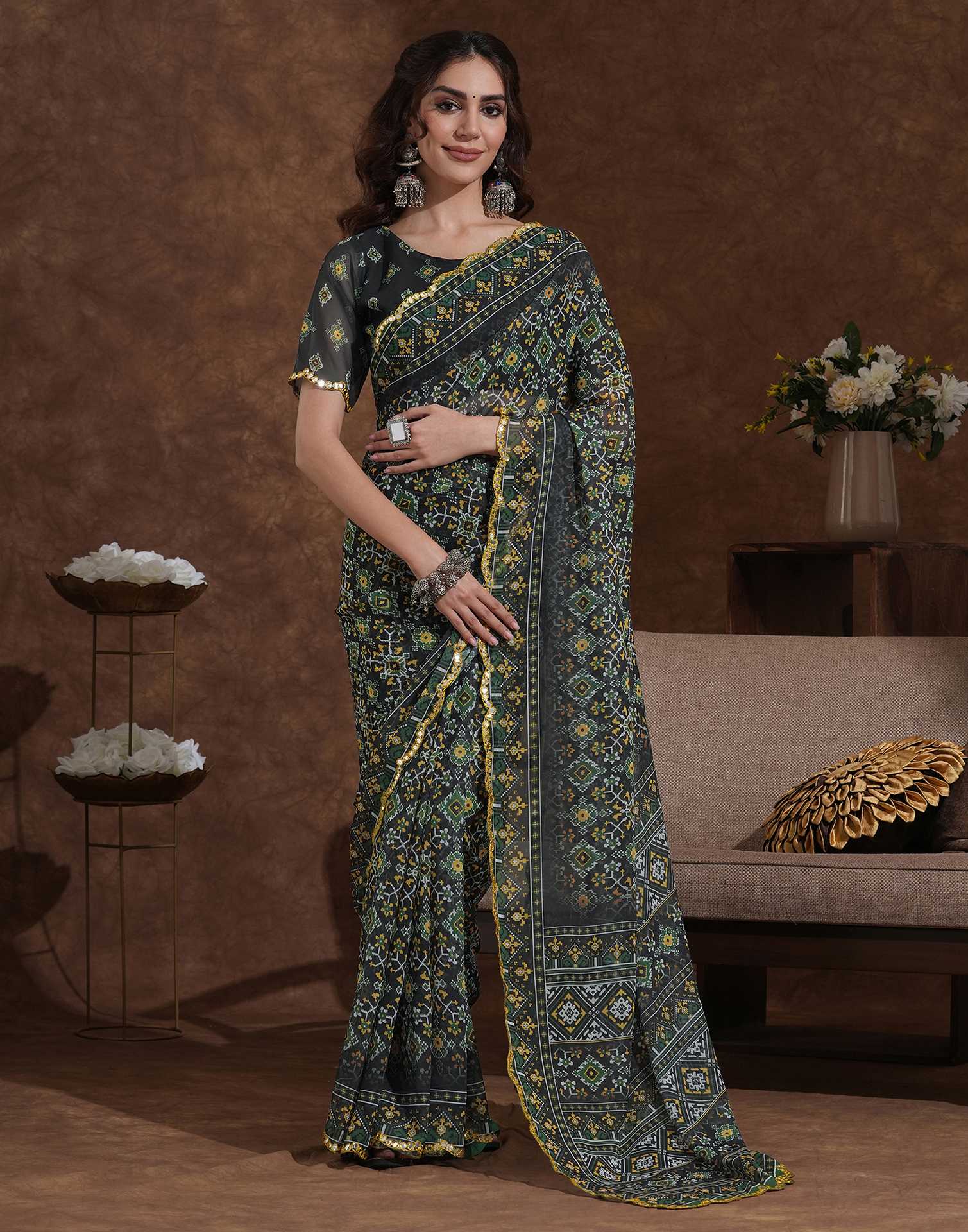 Women’s Ajrakh print saree with rust  blouse, ethnic geometric motifs and traditional Indian craftsmanship