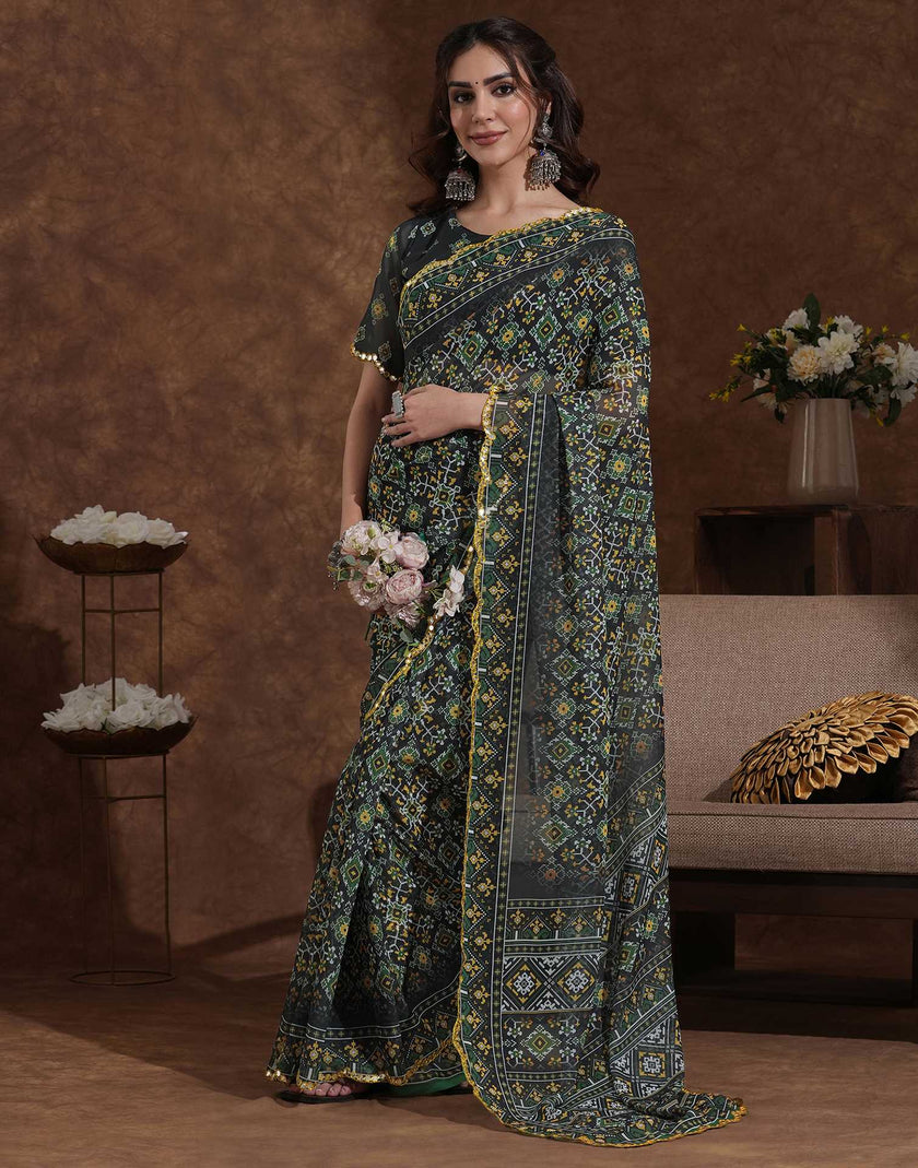 Traditional Printed Saree with Elegant Border for Daily & Festive Wear.