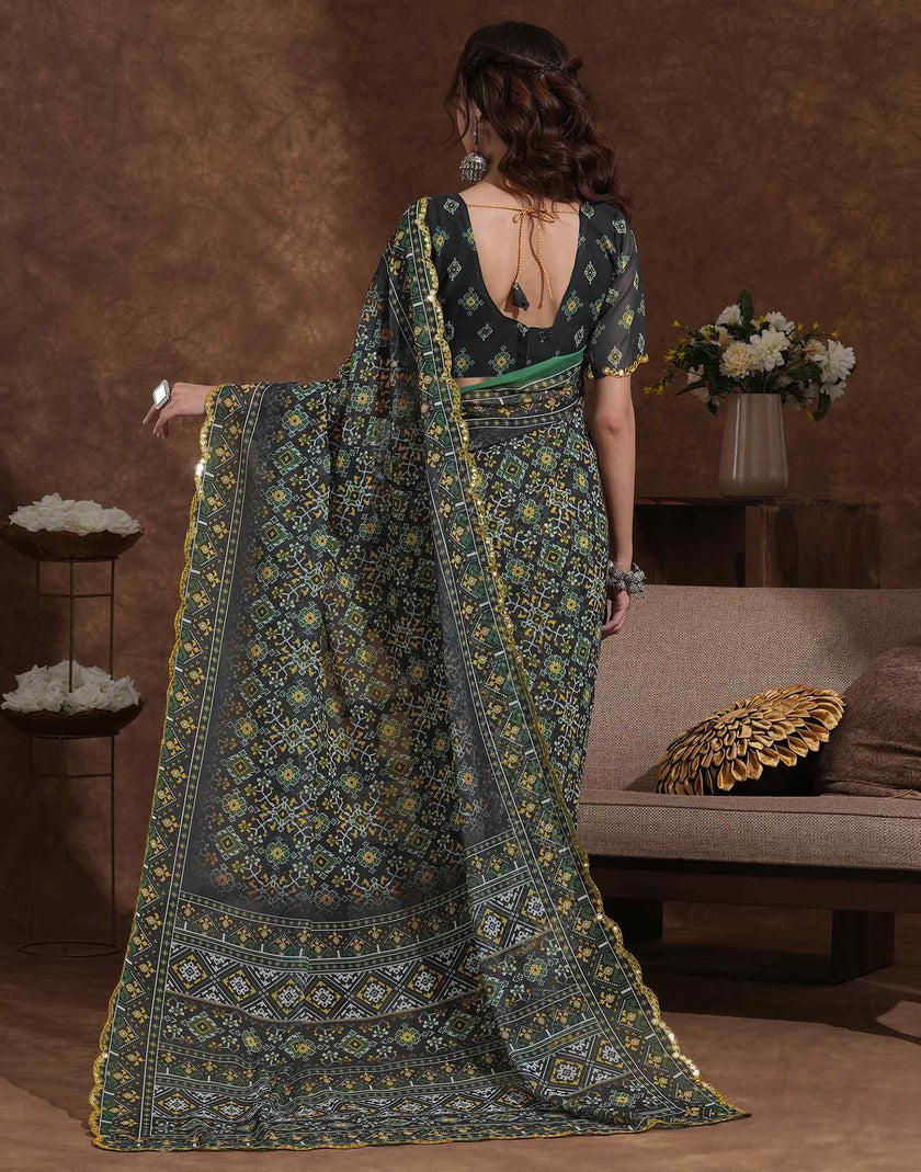 Traditional Printed Saree with Elegant Border for Daily & Festive Wear.