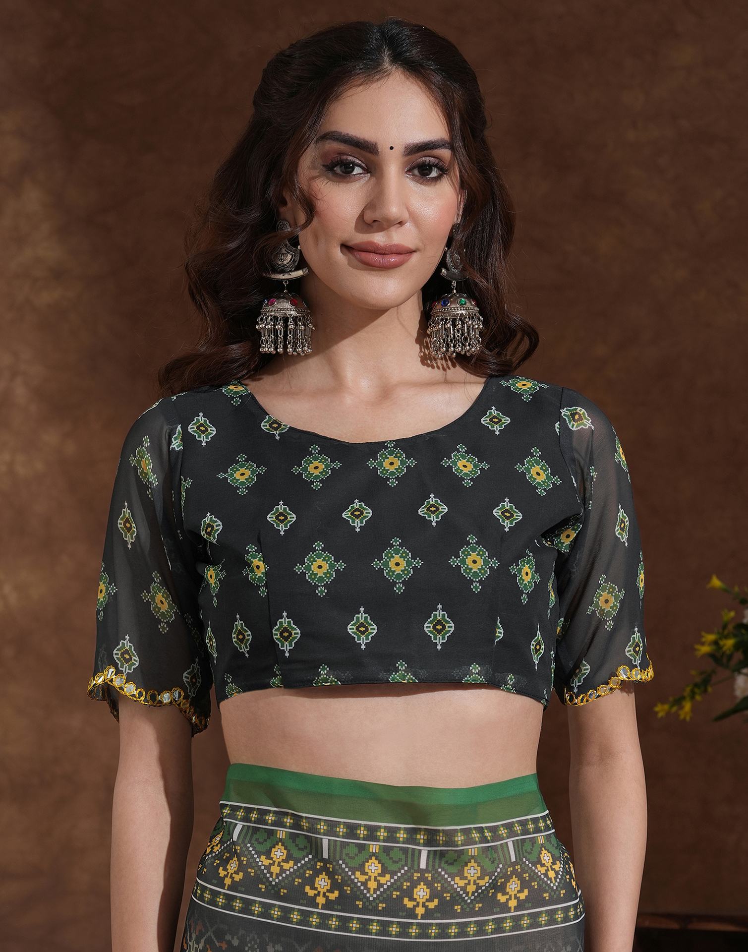 Traditional Printed Saree with Elegant Border for Daily & Festive Wear.