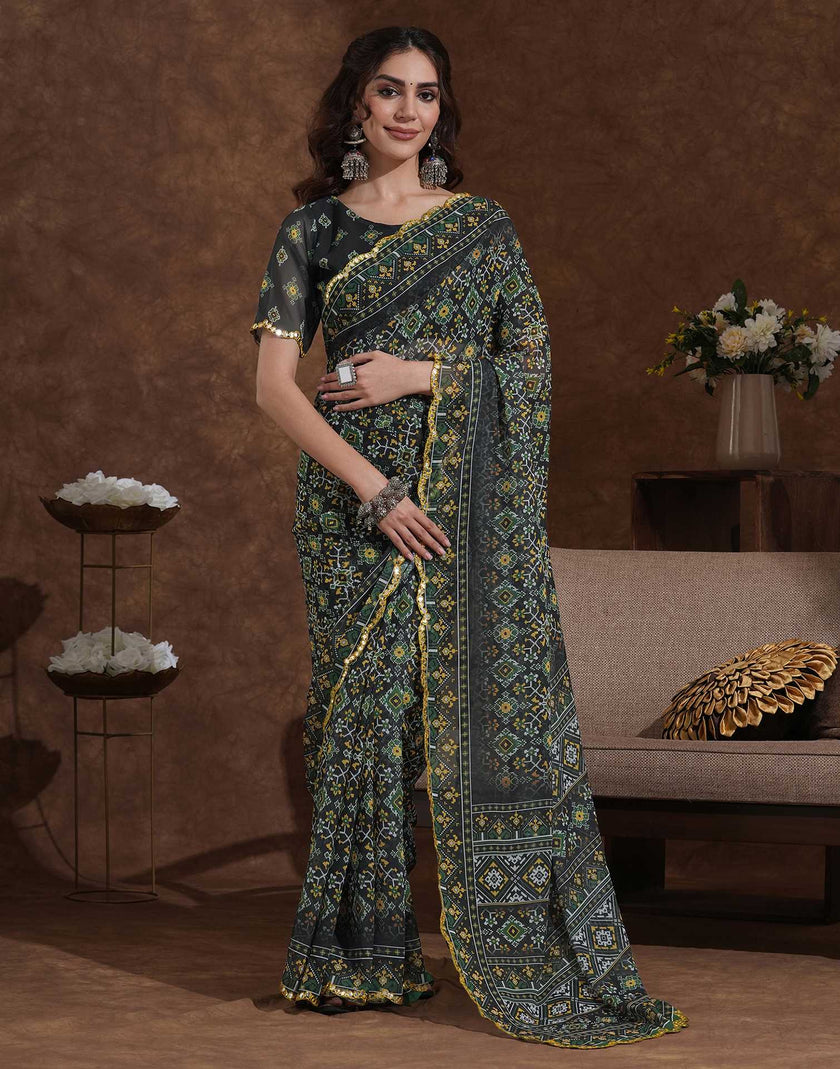 Women’s Ajrakh print saree with rust  blouse, ethnic geometric motifs and traditional Indian craftsmanship