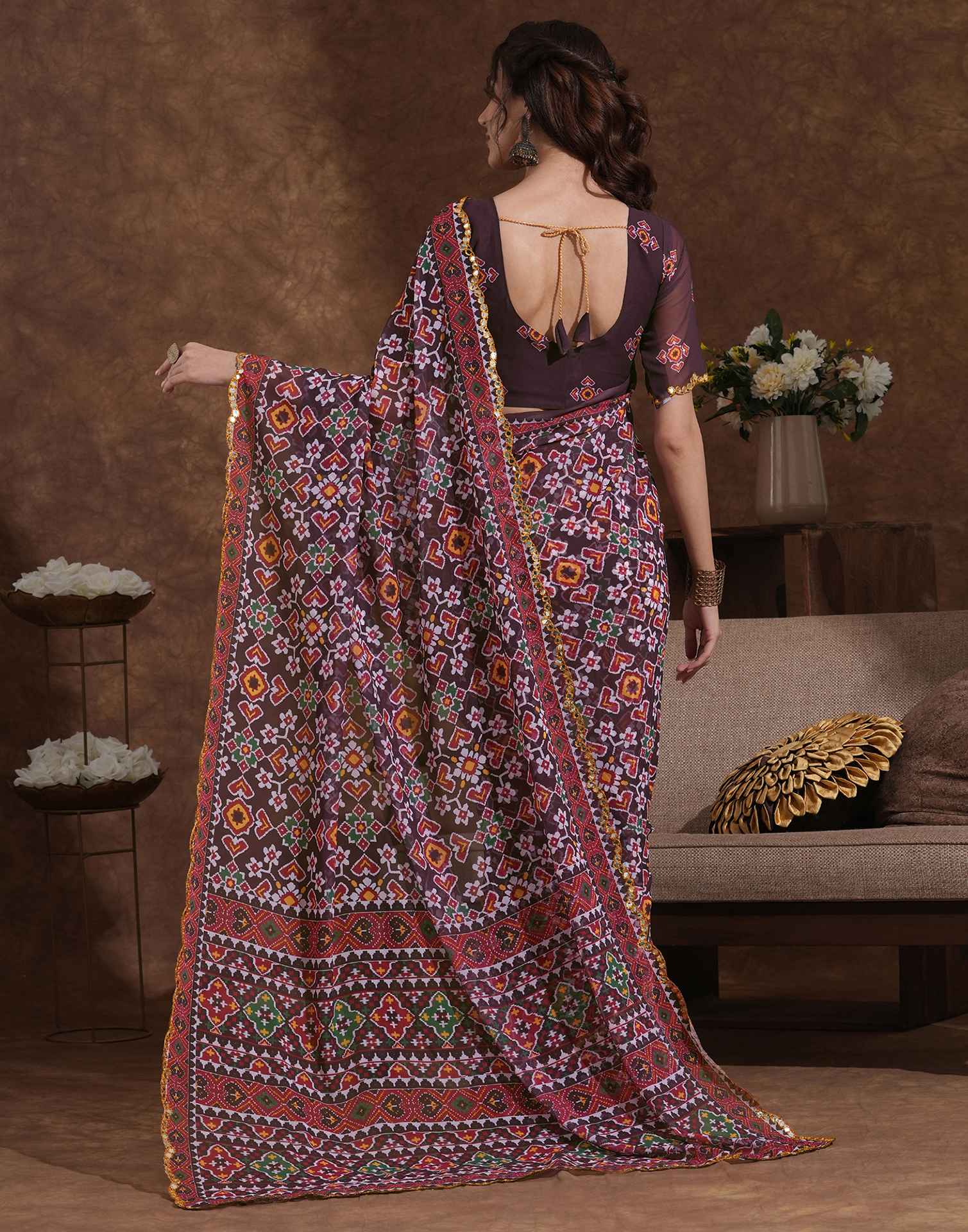 Traditional Printed Saree with Elegant Border for Daily & Festive Wear.