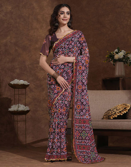 Women’s Ajrakh print saree with rust  blouse, ethnic geometric motifs and traditional Indian craftsmanship