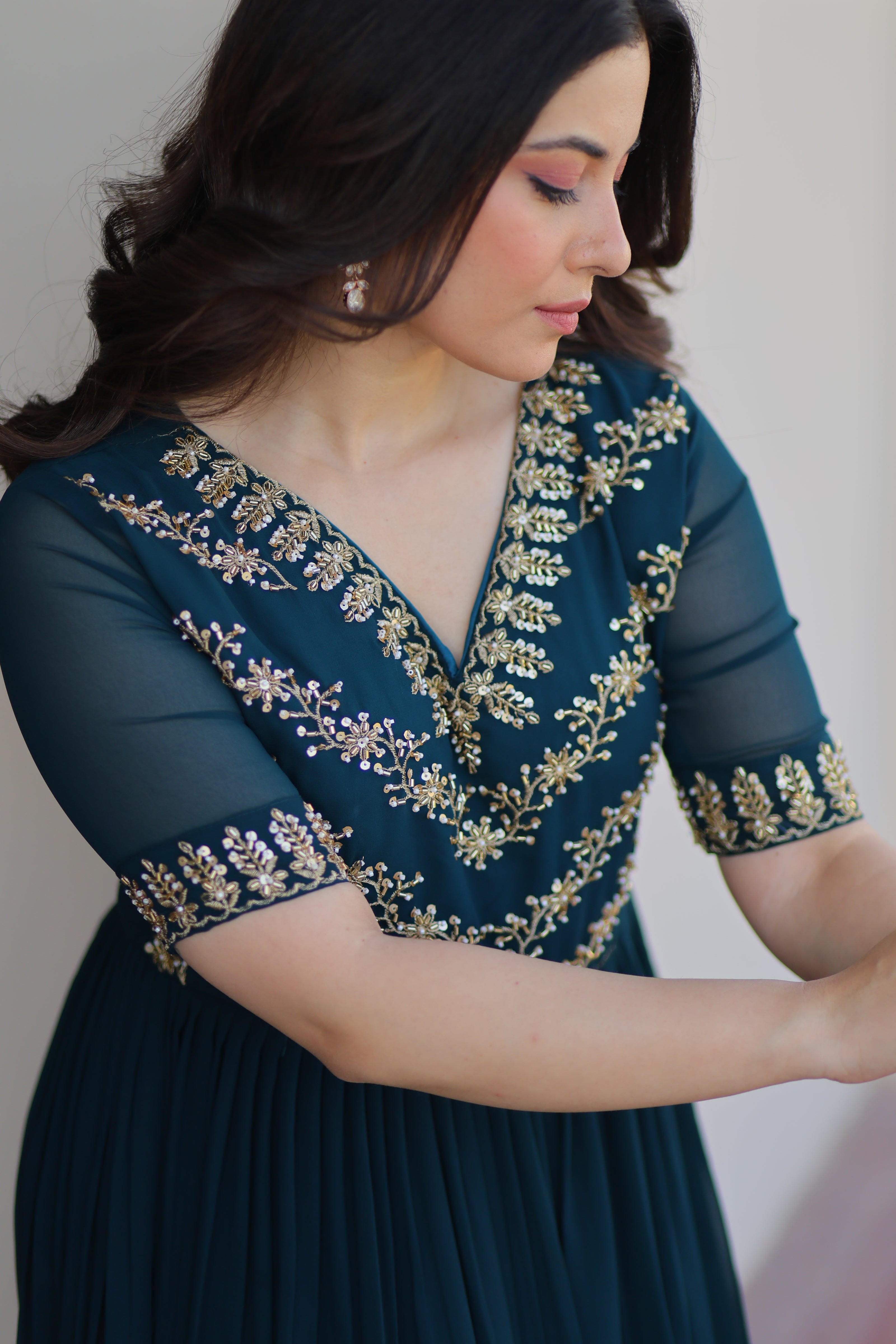 Premium Designer Ready-made Gown Collection.
