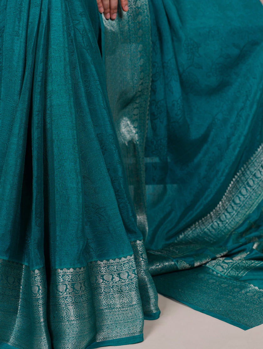 Chinon Silk Saree with Designer Pallu & Graceful Drape.