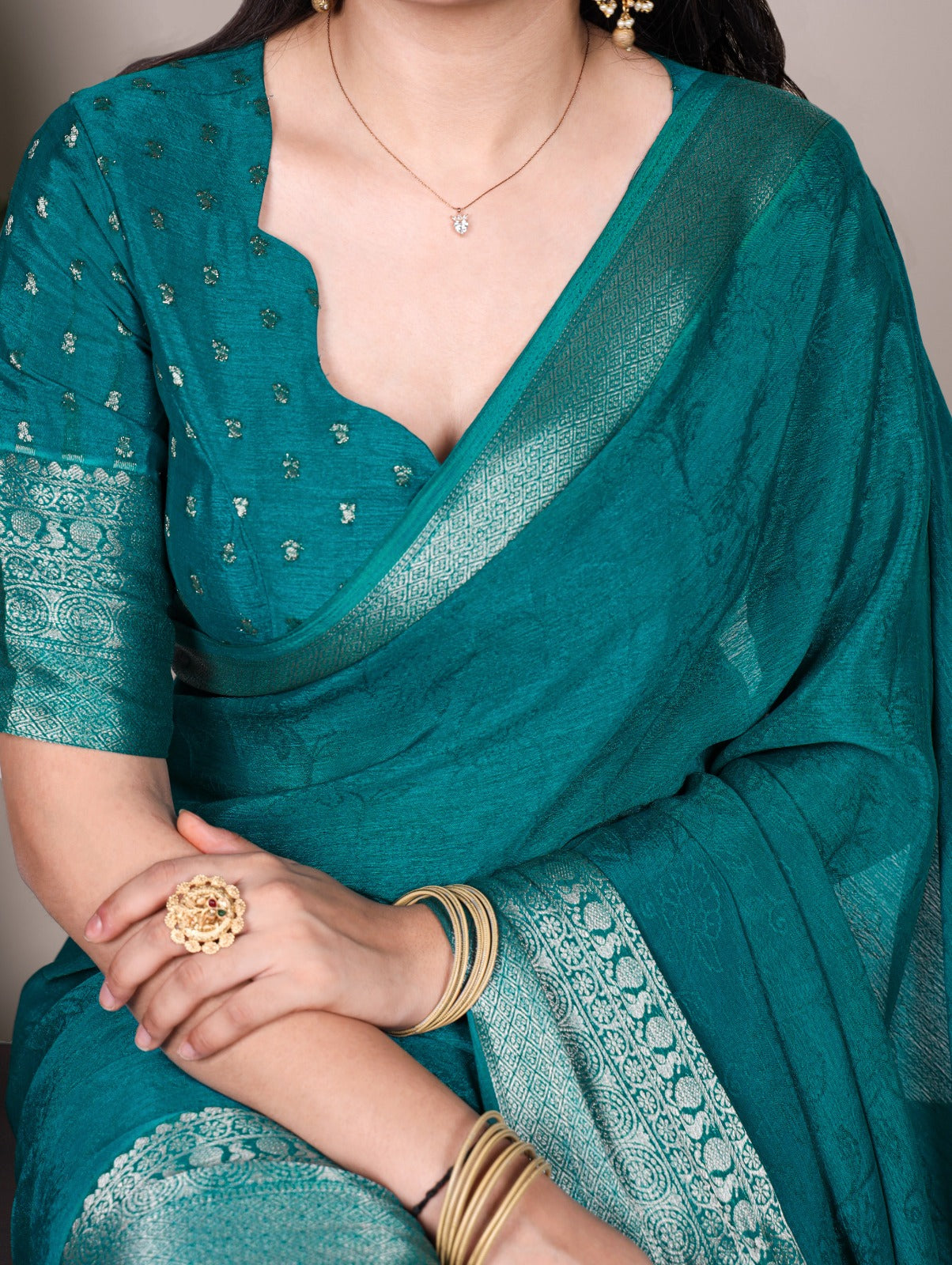 Chinon Silk Saree with Designer Pallu & Graceful Drape.