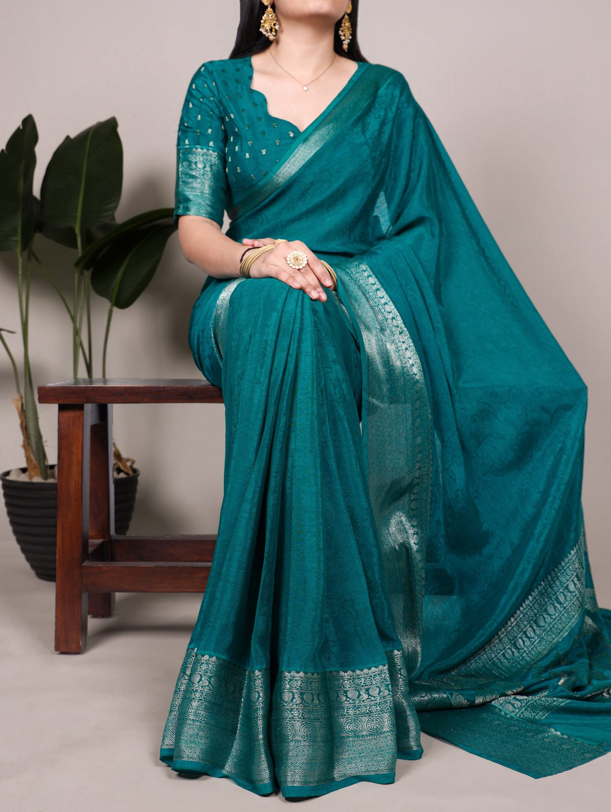 Chinon Silk Saree with Designer Pallu & Graceful Drape.