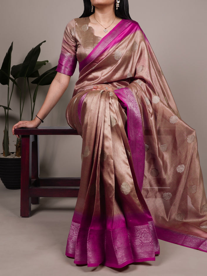 Elegant Banarasi Silk Blend Saree with Woven Zari Motifs.