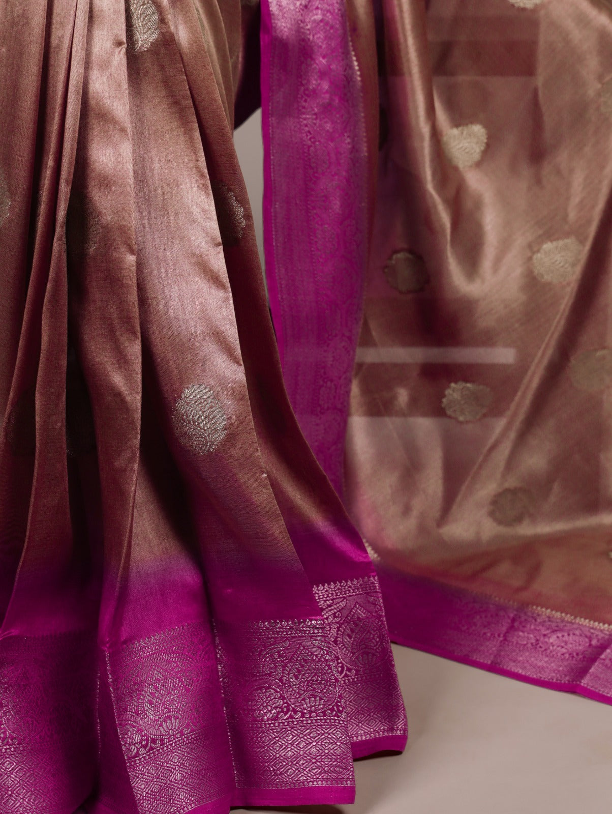 Elegant Banarasi Silk Blend Saree with Woven Zari Motifs.