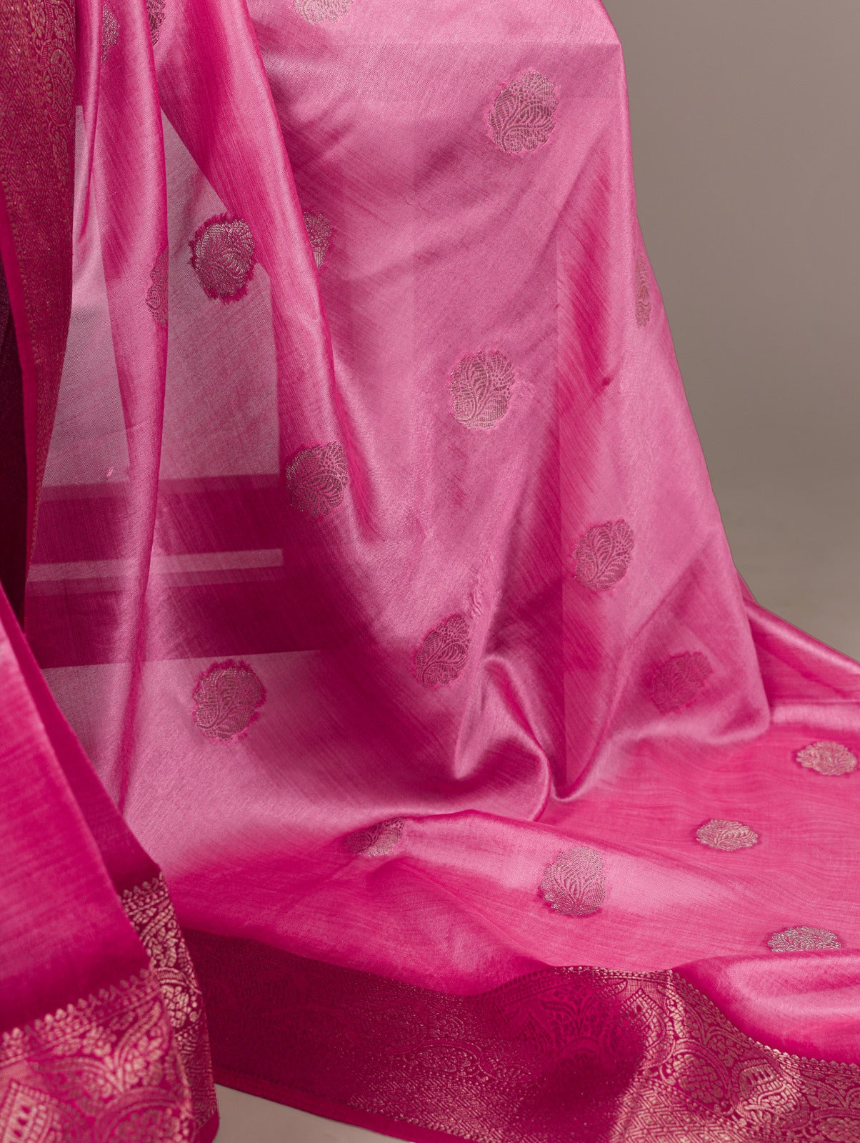 Elegant Banarasi Silk Blend Saree with Woven Zari Motifs.