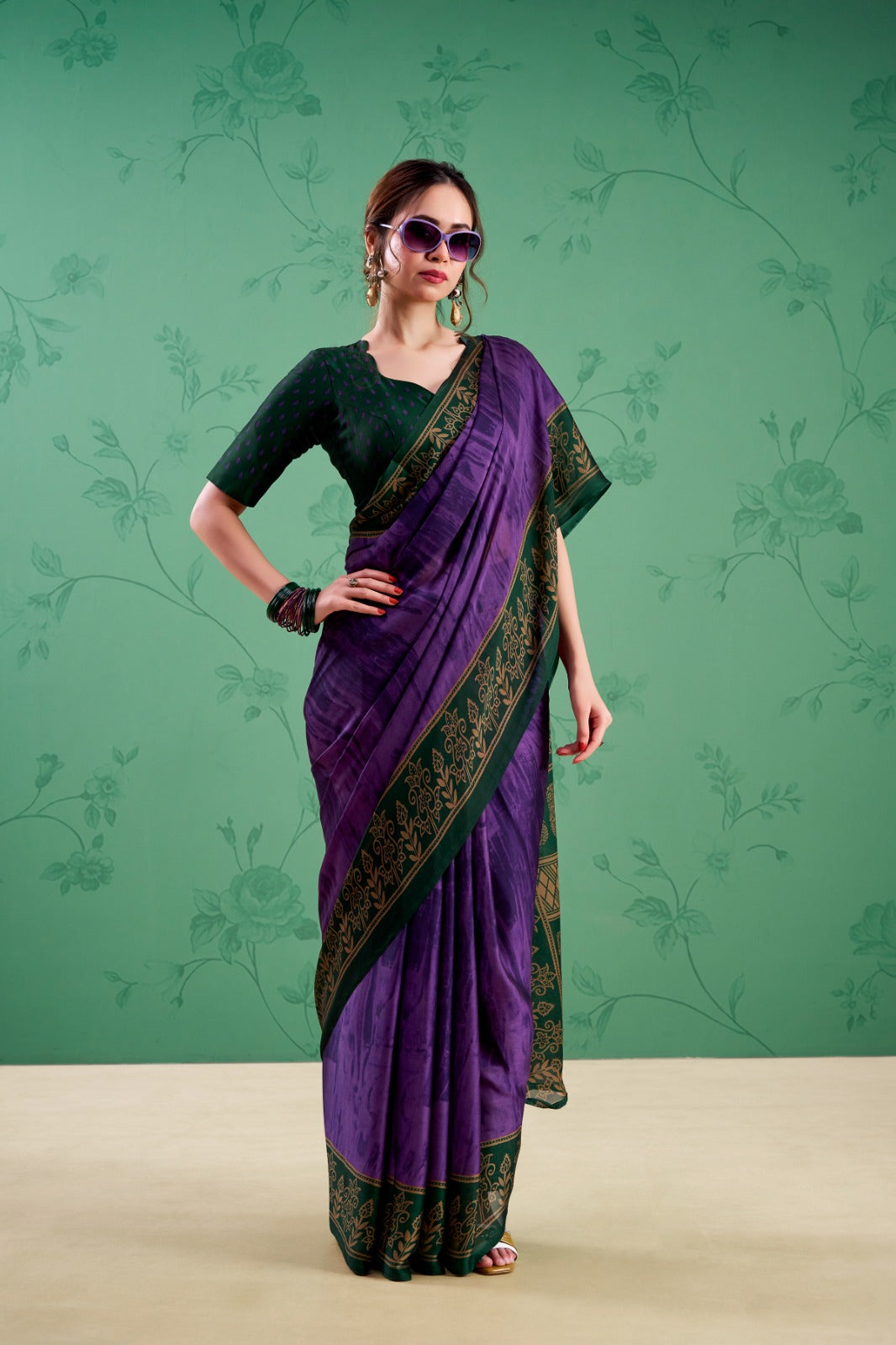 Women’s Purple saree with traditional border and contrasting blouse