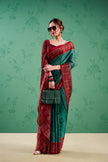 Women’s Rama saree with traditional border and contrasting blouse