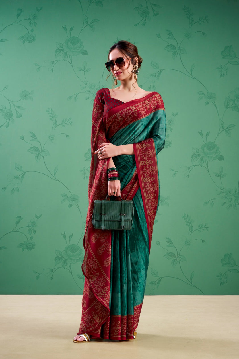Women’s Rama saree with traditional border and contrasting blouse