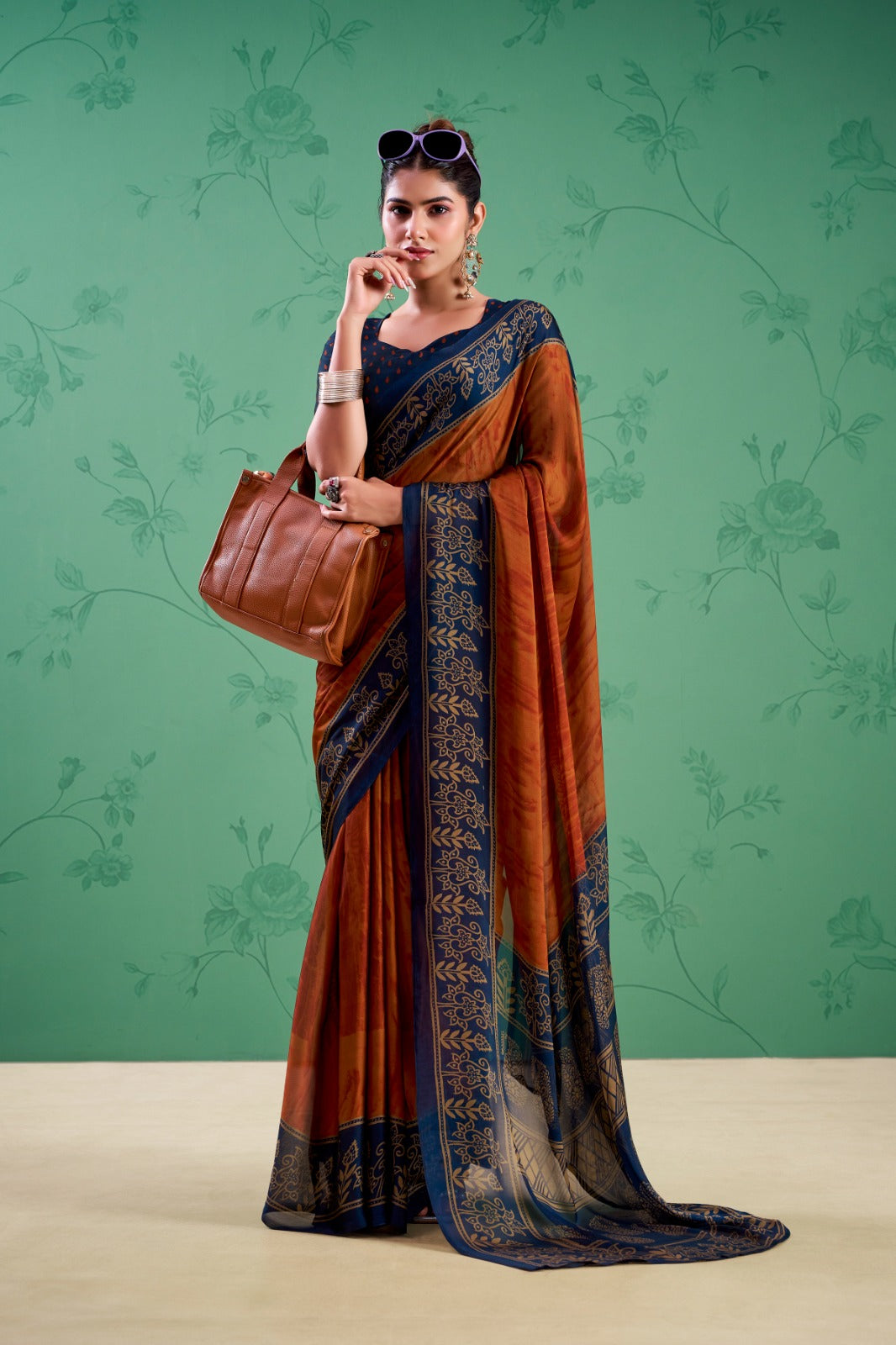Women’s Orane saree with traditional border and contrasting blouse