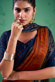 Elegant Ethnic Saree with Rich Woven Border Design.